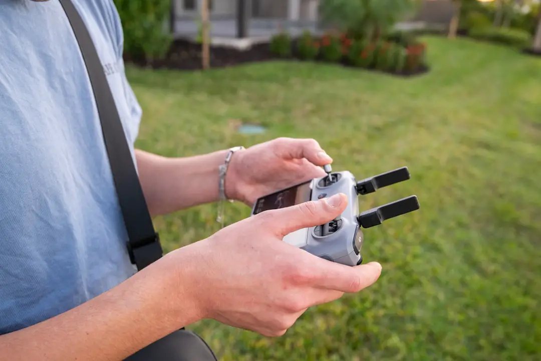 A person holding a camera in their hands